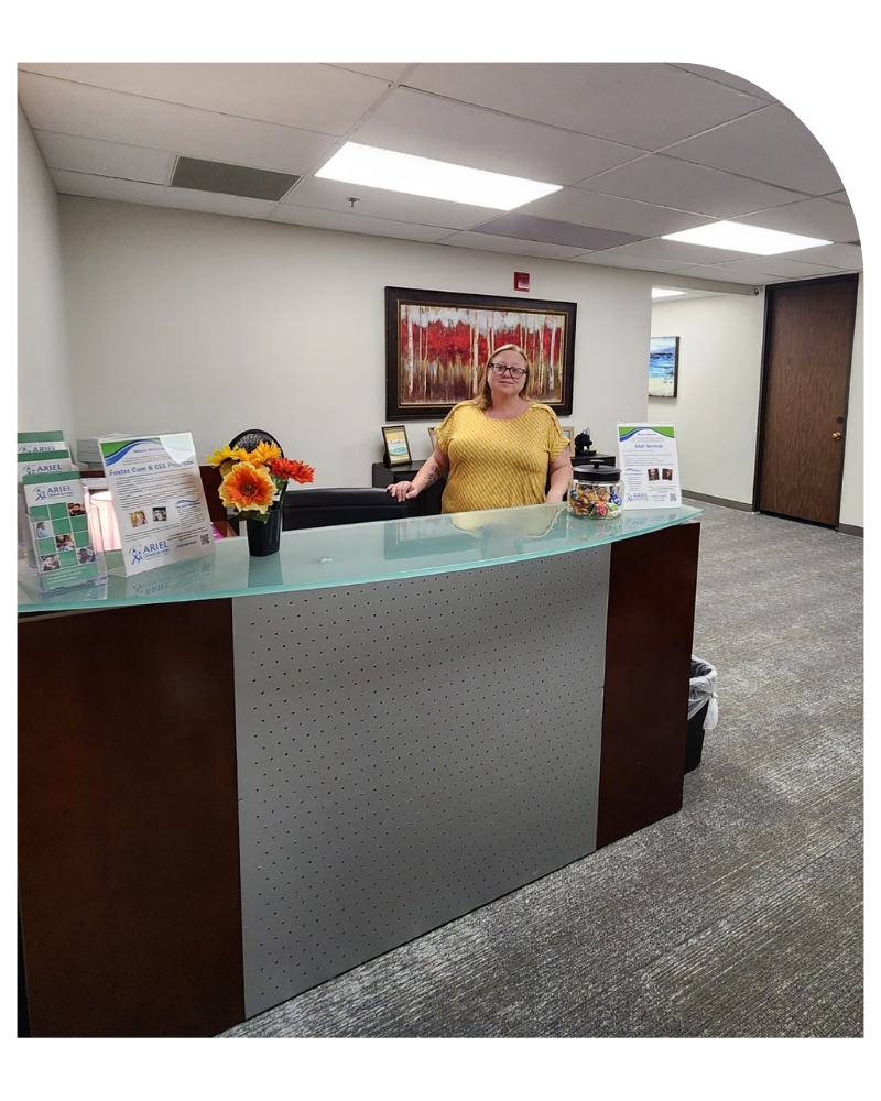Ariel Clinical Services Pueblo office reception area with staff member