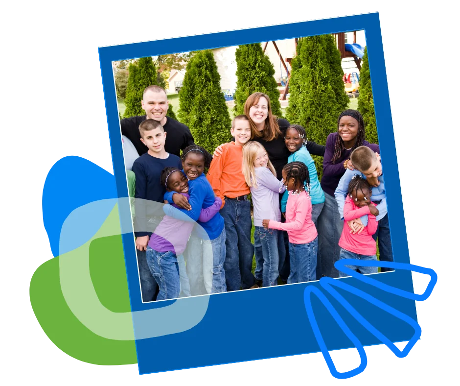 adoption-large-family-outdoors A large family with many children standing together outdoors