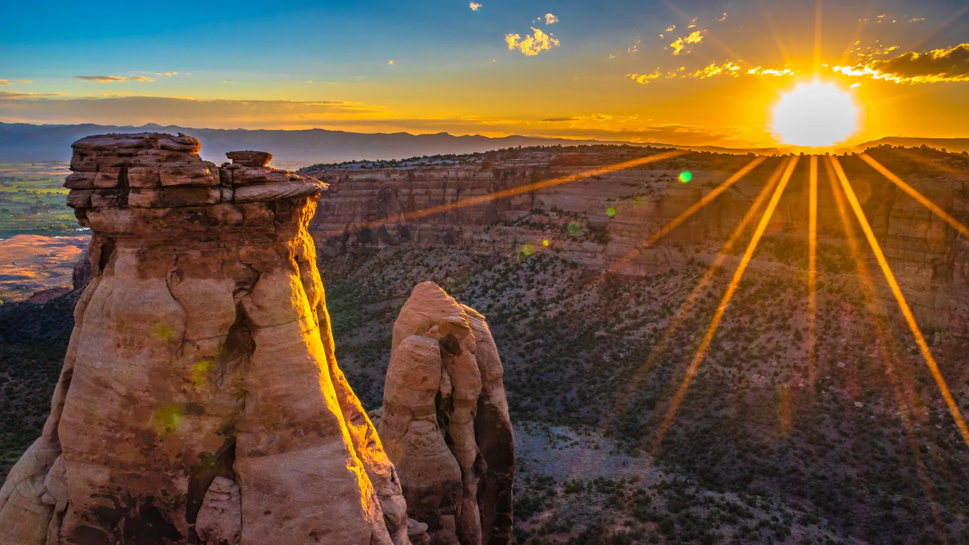 Sandstone towers of Colorado National Monument at sunset near Grand Junction
